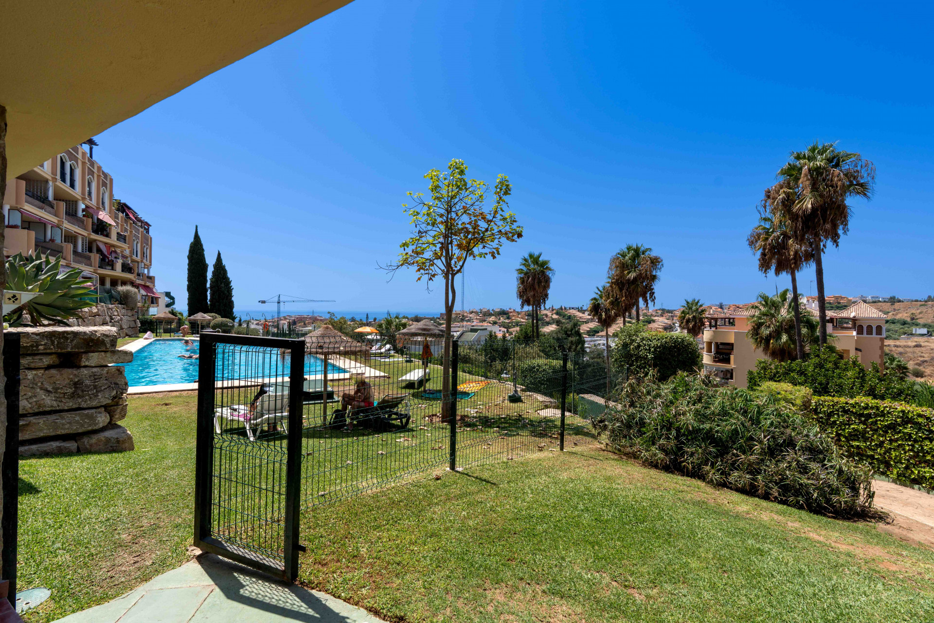 Renovated 2-Bedroom Apartment with Terrace, Parking and Pools in Mijas