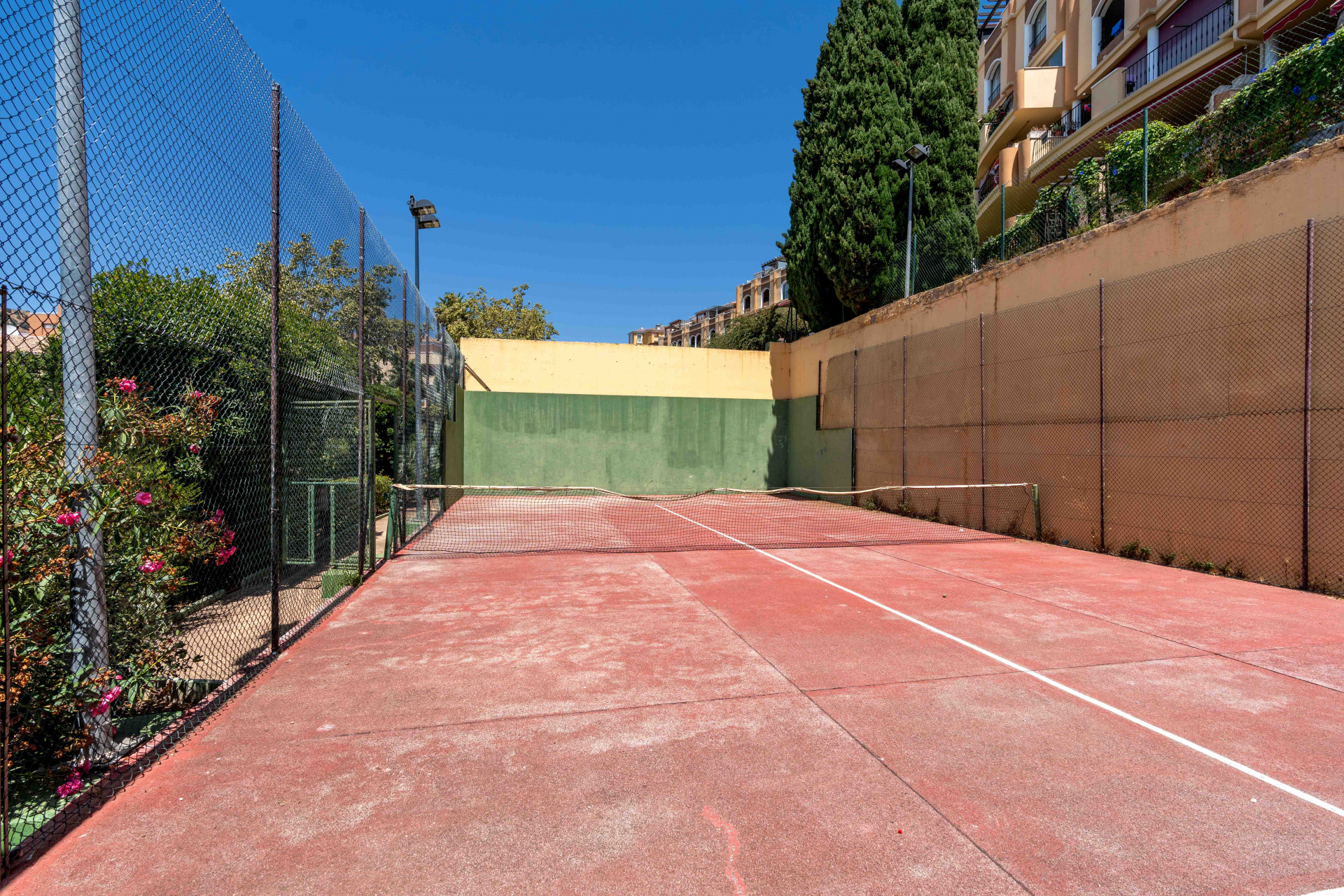 Renovated 2-Bedroom Apartment with Terrace, Parking and Pools in Mijas