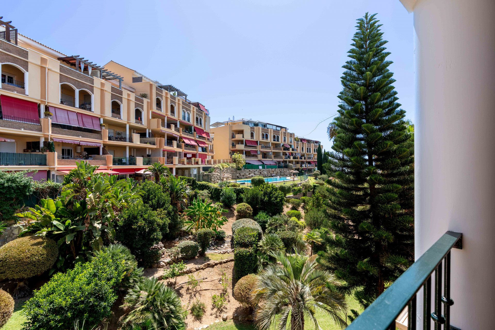 Renovated 2-Bedroom Apartment with Terrace, Parking and Pools in Mijas