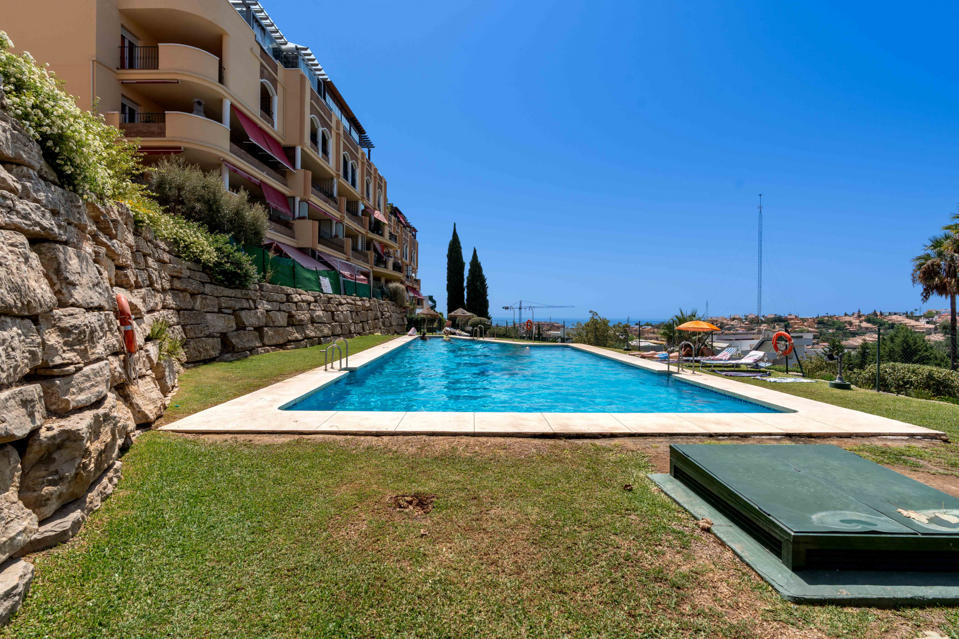 Renovated 2-Bedroom Apartment with Terrace, Parking and Pools in Mijas
