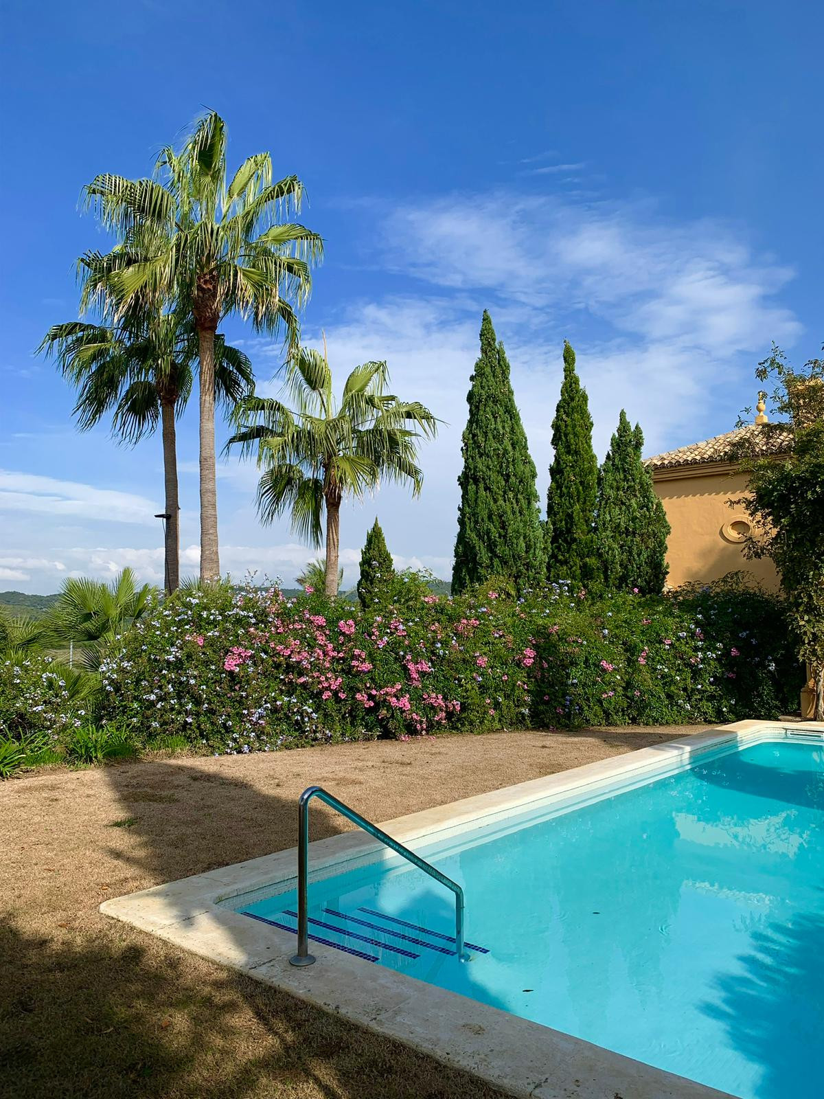 Stylish 4-Bedroom Townhouse in the Exclusive gated Almenara Golf, Panoramic Golf, Mountain & Partial Lake Views in Sotogrande