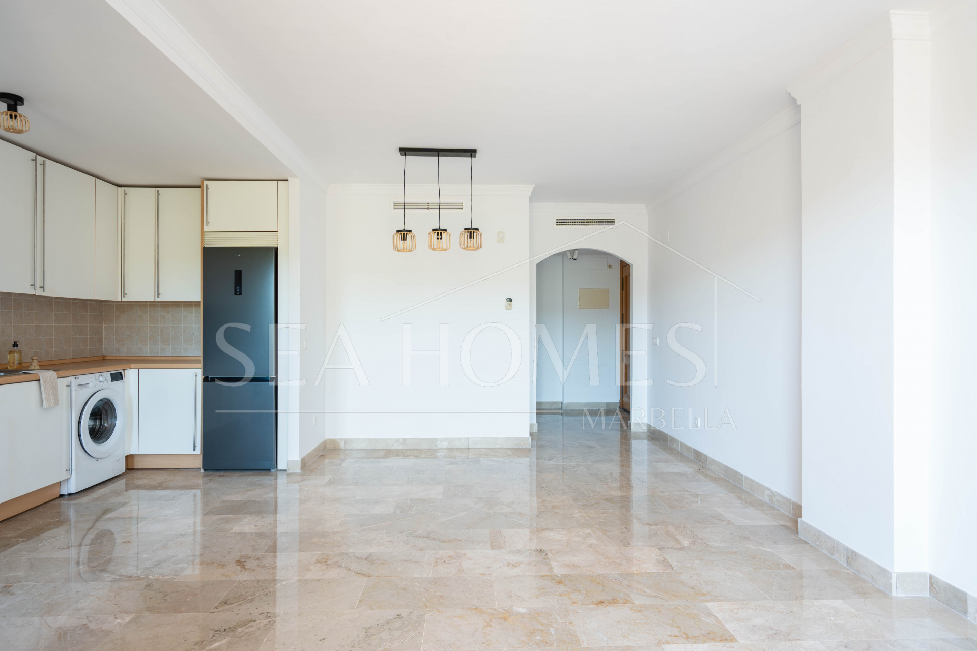 Elegant Coastal Living in Estepona – Corner Garden Apartment with Style & Serenity in Costa Galera