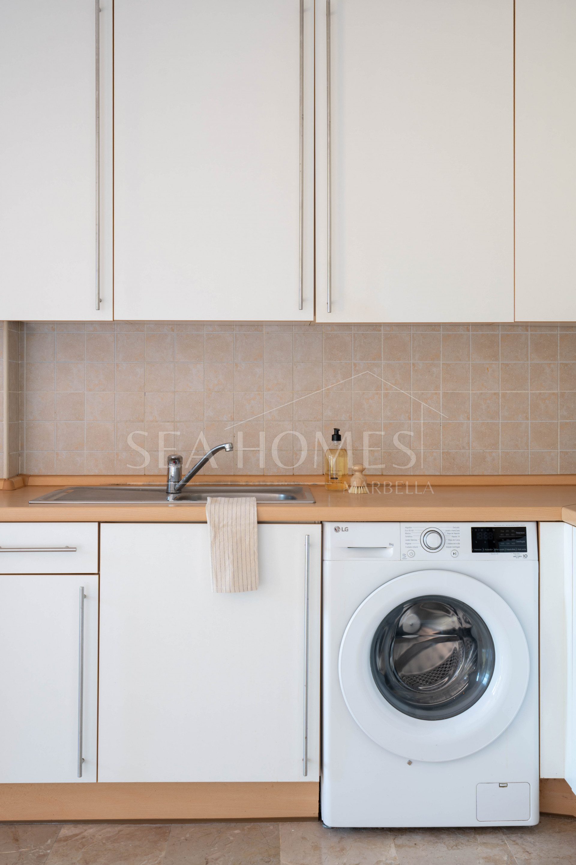 Elegant Coastal Living in Estepona – Corner Garden Apartment with Style & Serenity in Costa Galera