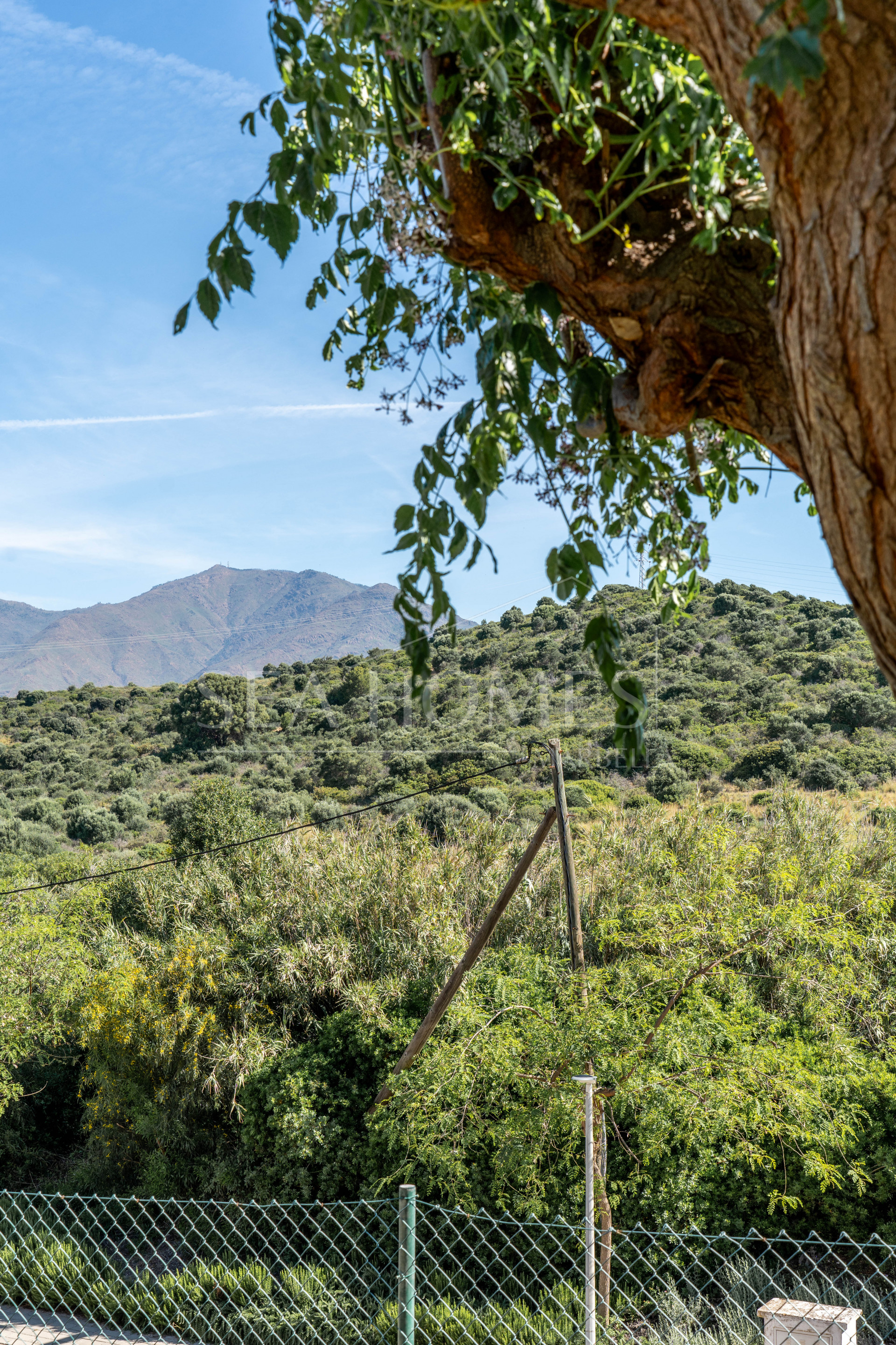 Elegant Coastal Living in Estepona – Corner Garden Apartment with Style & Serenity in Costa Galera