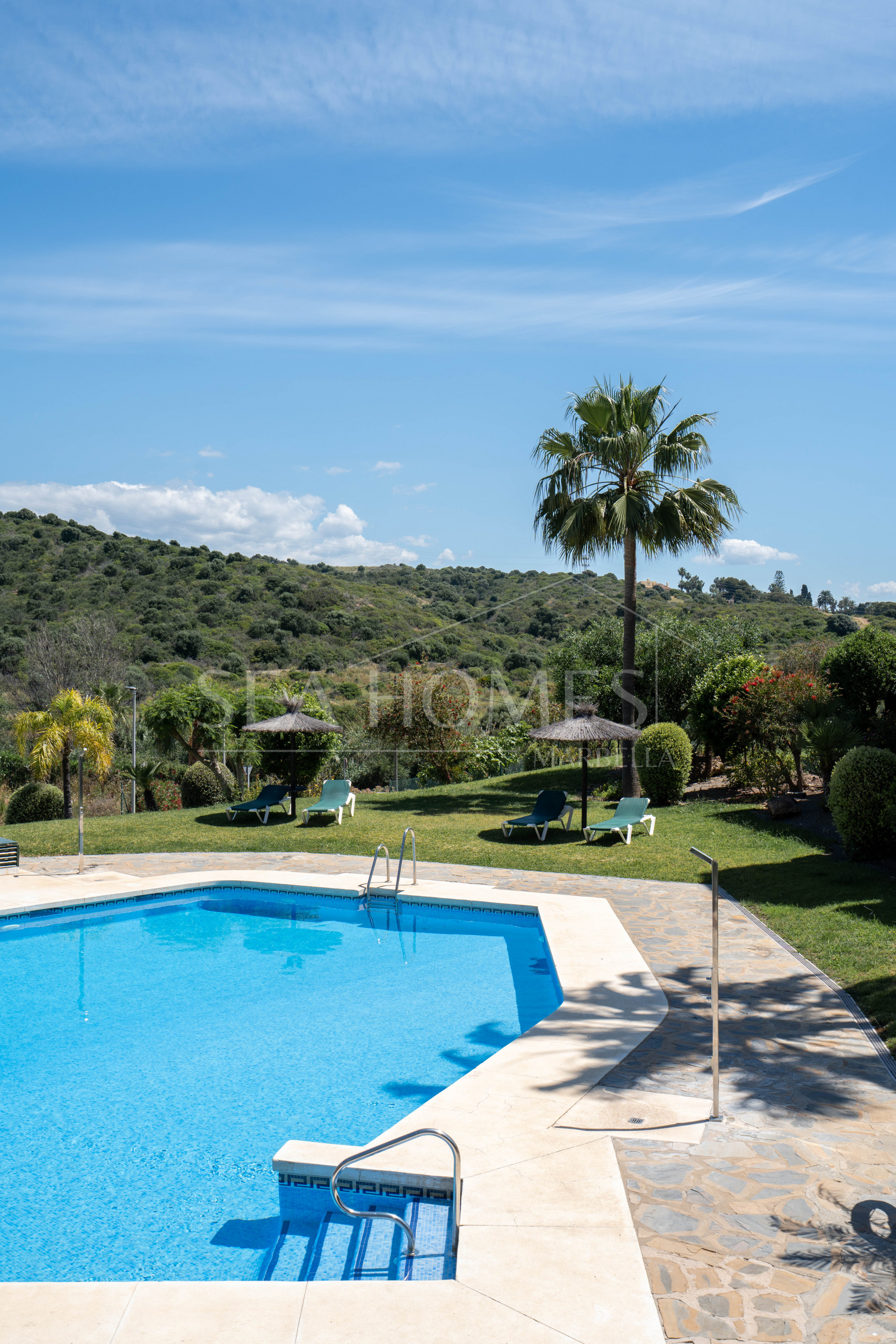 Elegant Coastal Living in Estepona – Corner Garden Apartment with Style & Serenity in Costa Galera