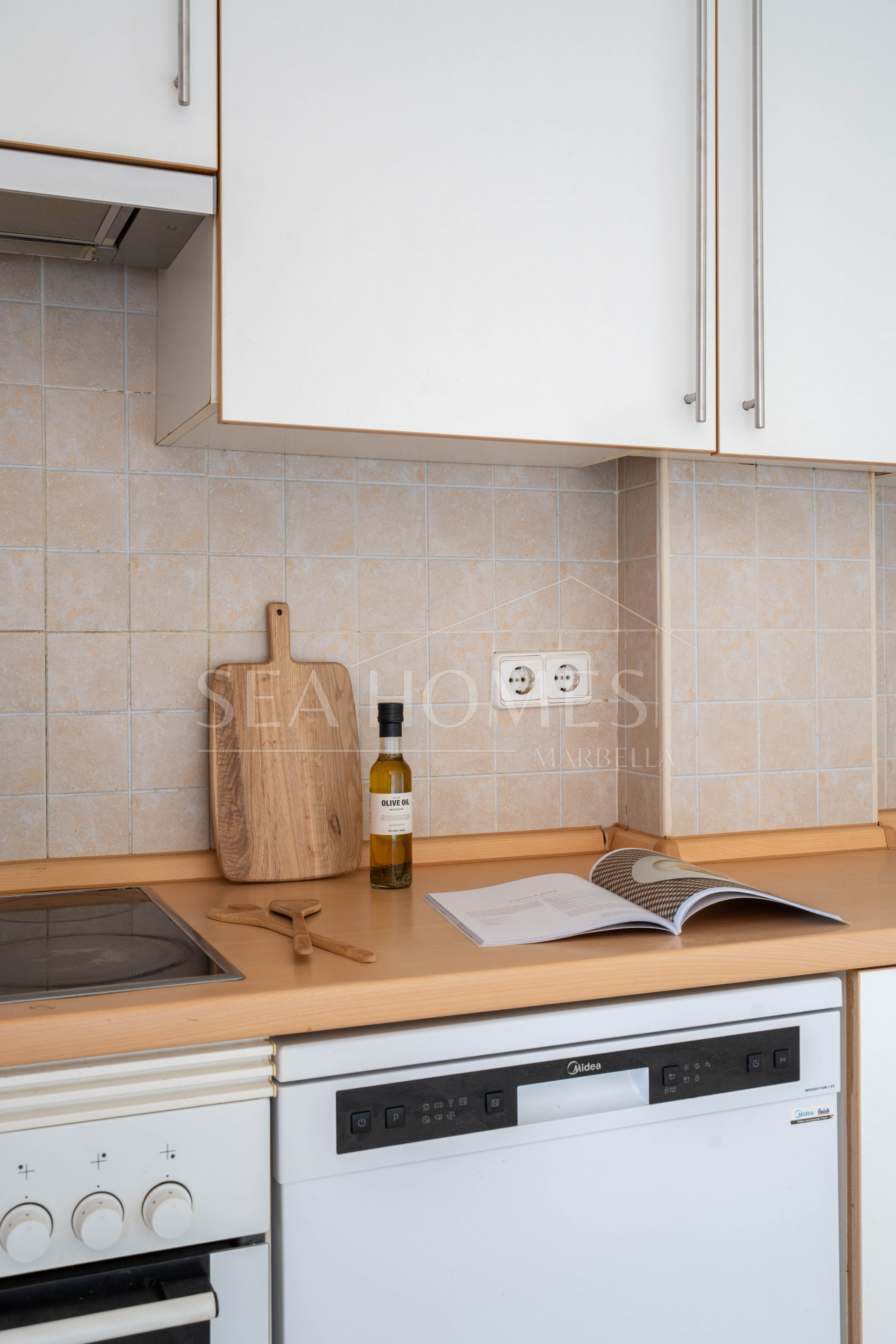 Elegant Coastal Living in Estepona – Corner Garden Apartment with Style & Serenity in Costa Galera