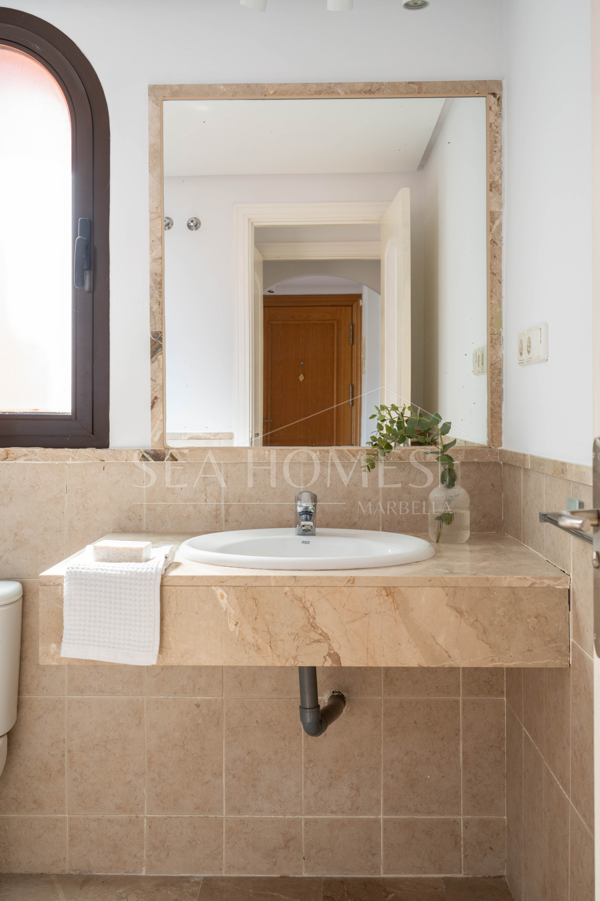 Elegant Coastal Living in Estepona – Corner Garden Apartment with Style & Serenity in Costa Galera