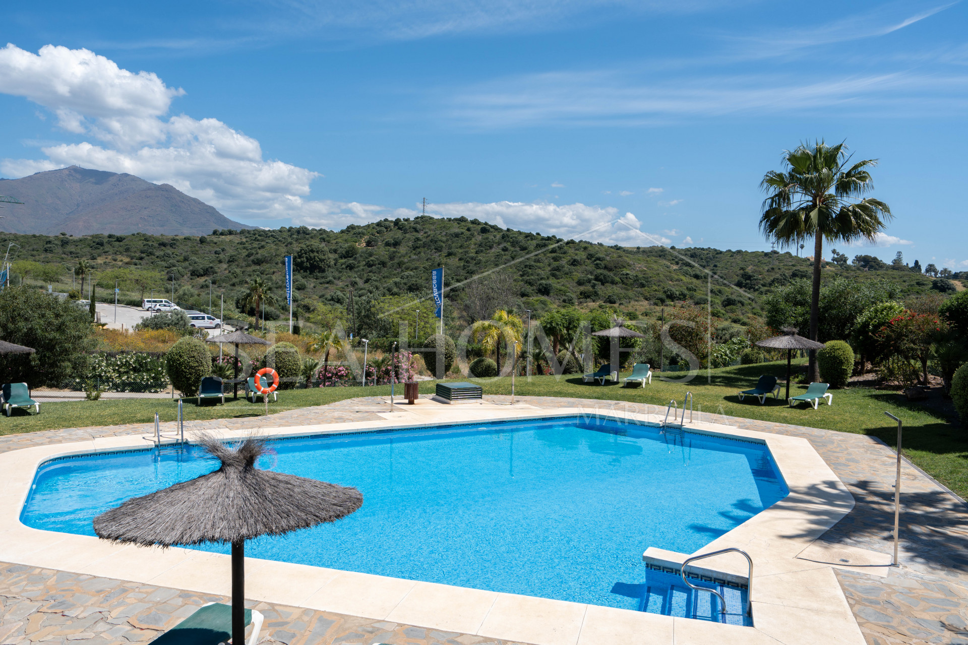 Elegant Coastal Living in Estepona – Corner Garden Apartment with Style & Serenity in Costa Galera