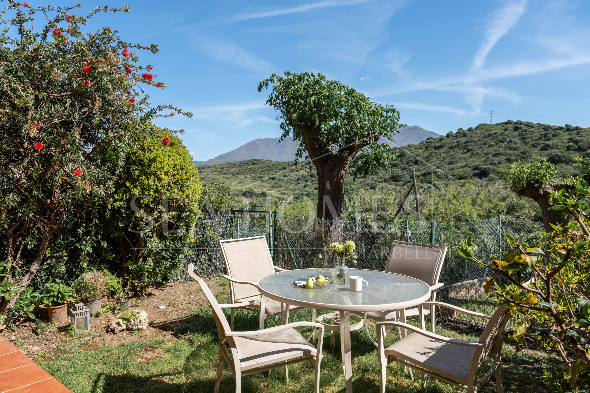 Elegant Coastal Living in Estepona – Corner Garden Apartment with Style & Serenity in Costa Galera