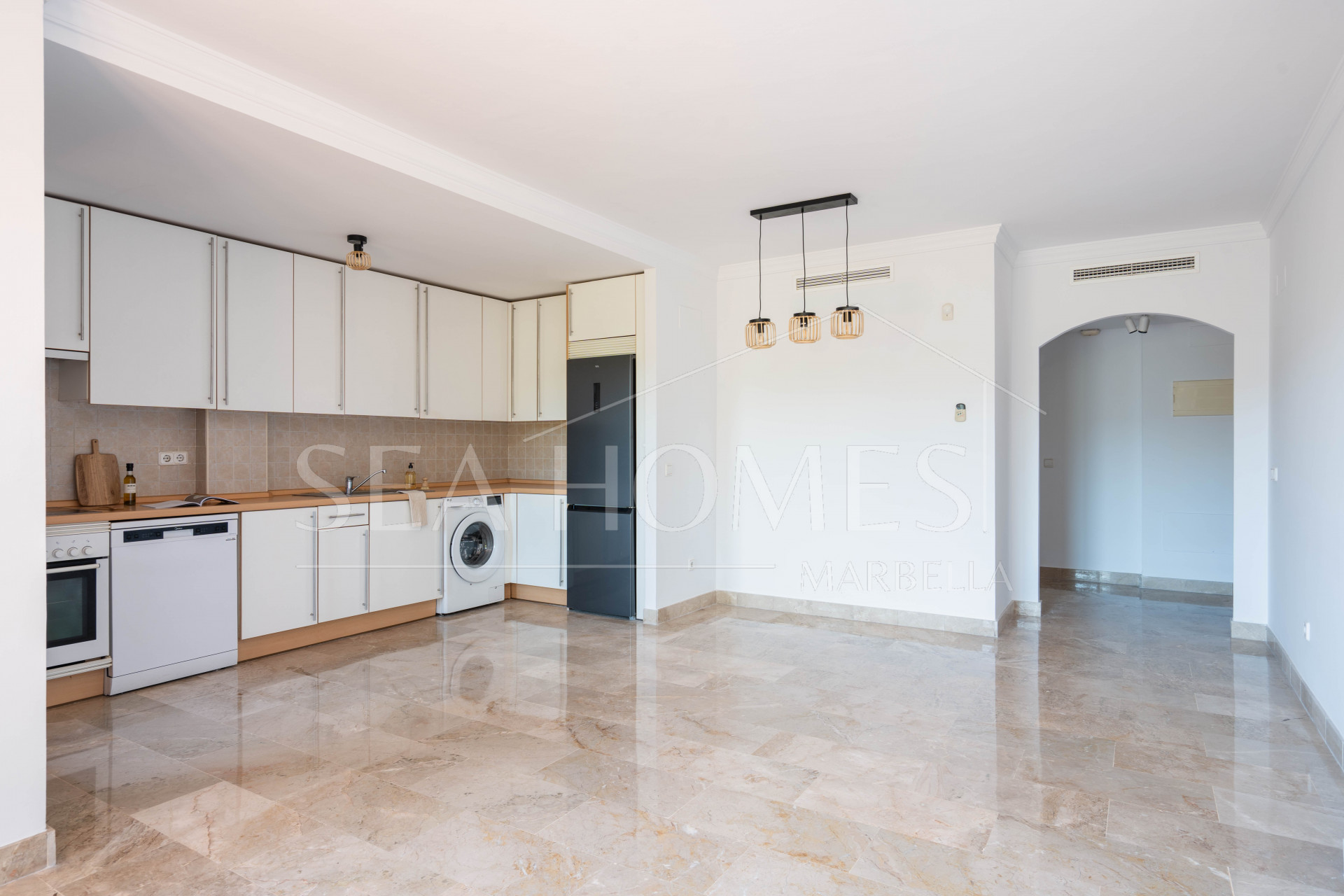 Elegant Coastal Living in Estepona – Corner Garden Apartment with Style & Serenity in Costa Galera
