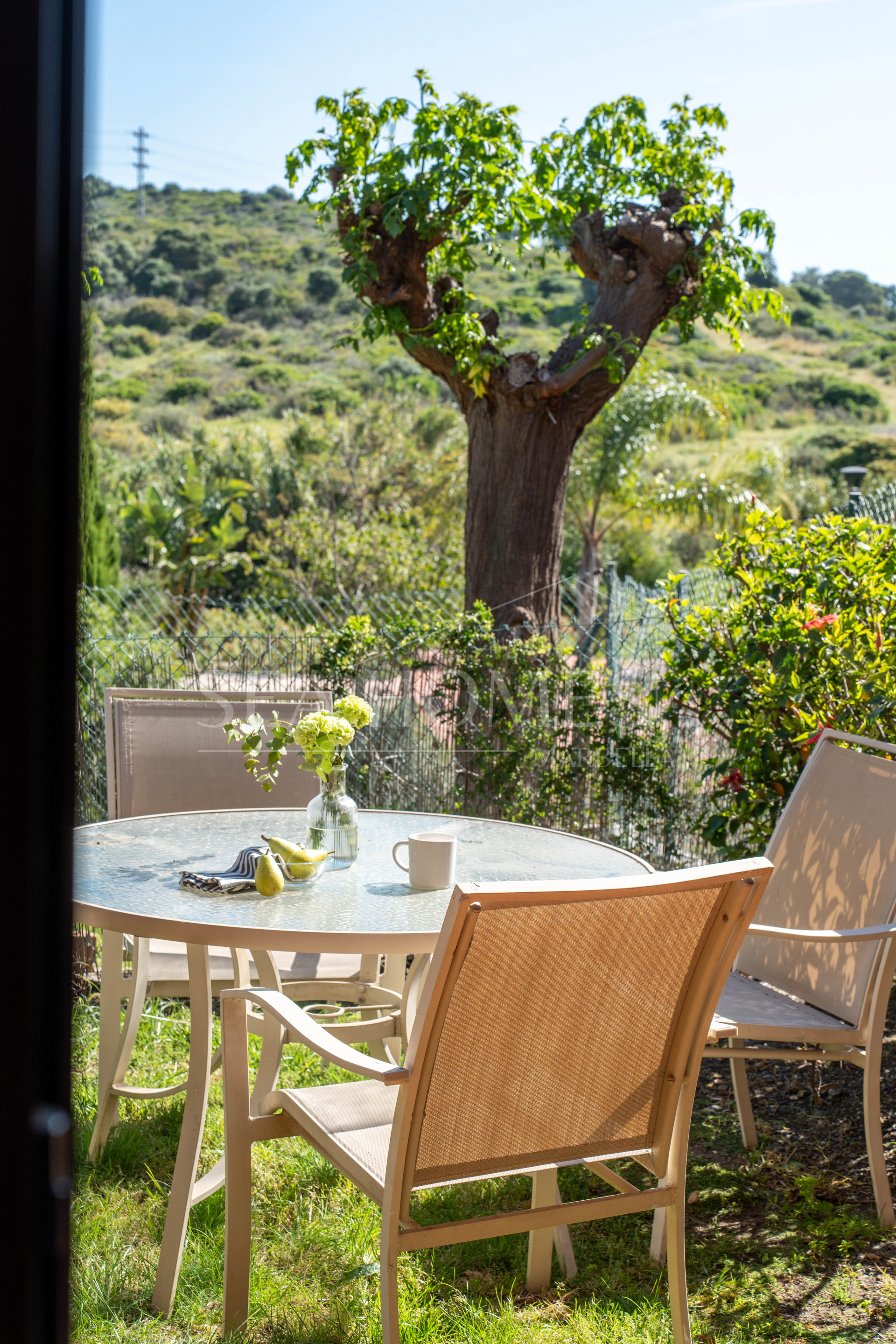 Elegant Coastal Living in Estepona – Corner Garden Apartment with Style & Serenity in Costa Galera