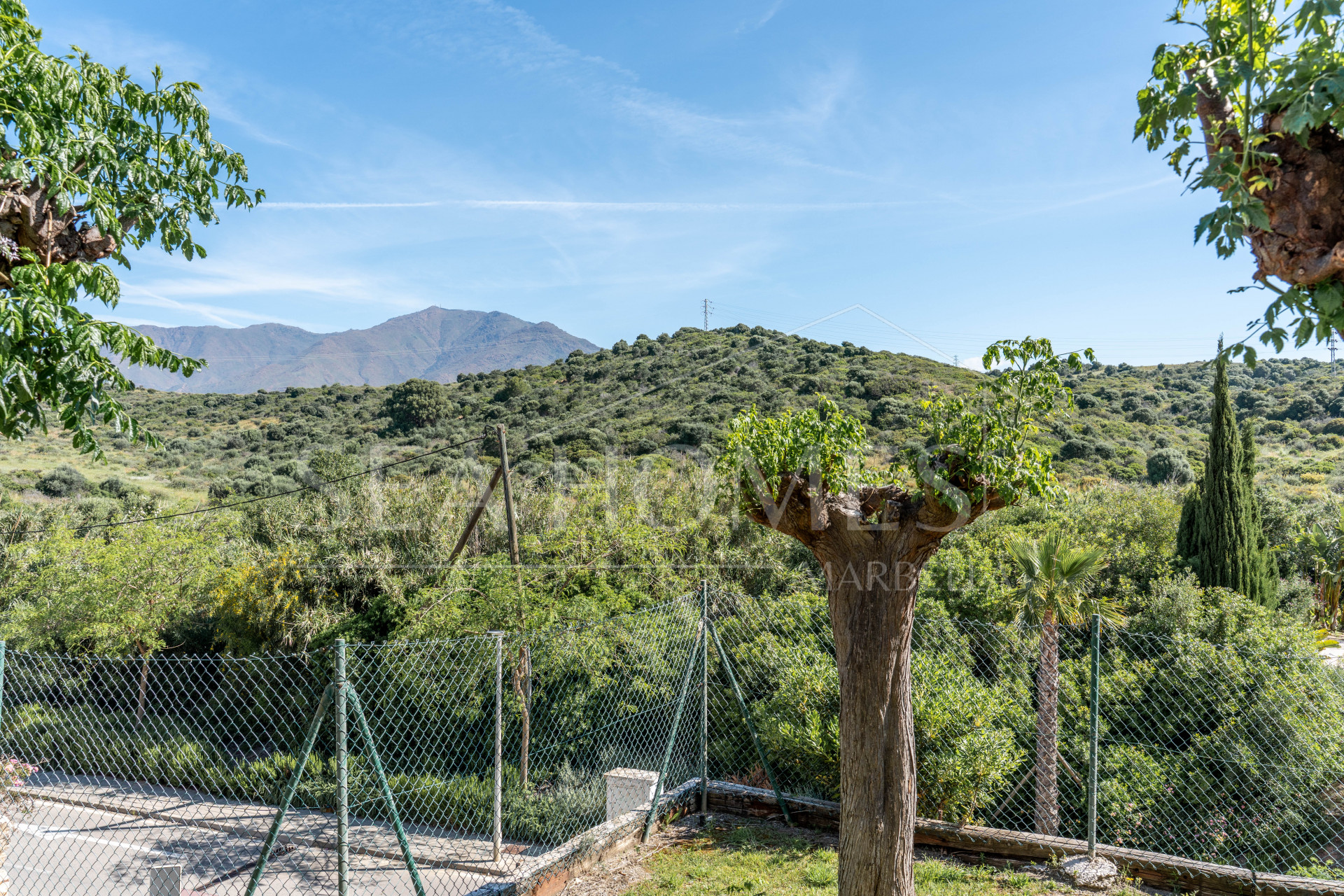 Elegant Coastal Living in Estepona – Corner Garden Apartment with Style & Serenity in Costa Galera