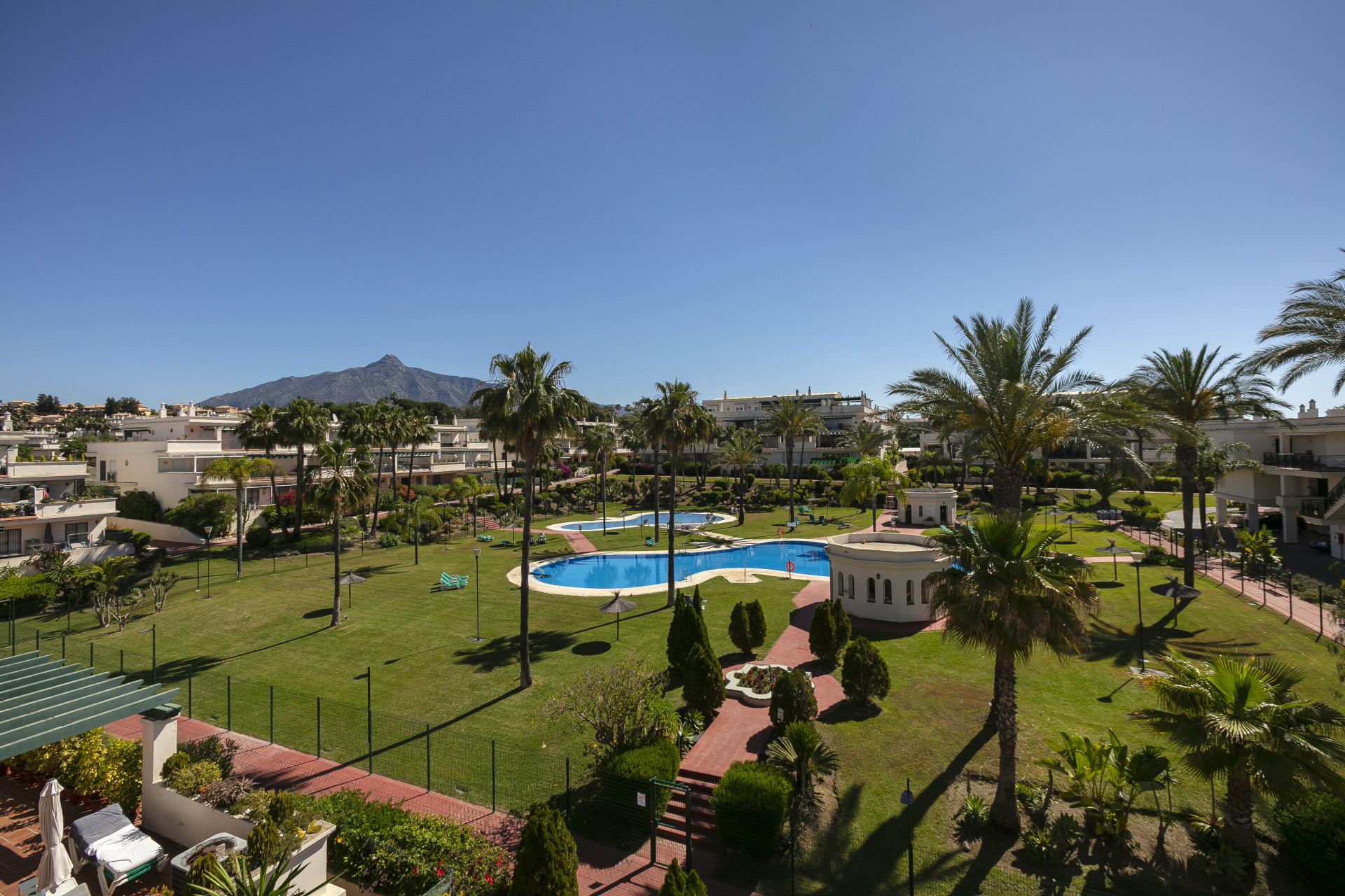 Beautiful 3 bedroom penthouse with views to the pool and mountains from a hug...