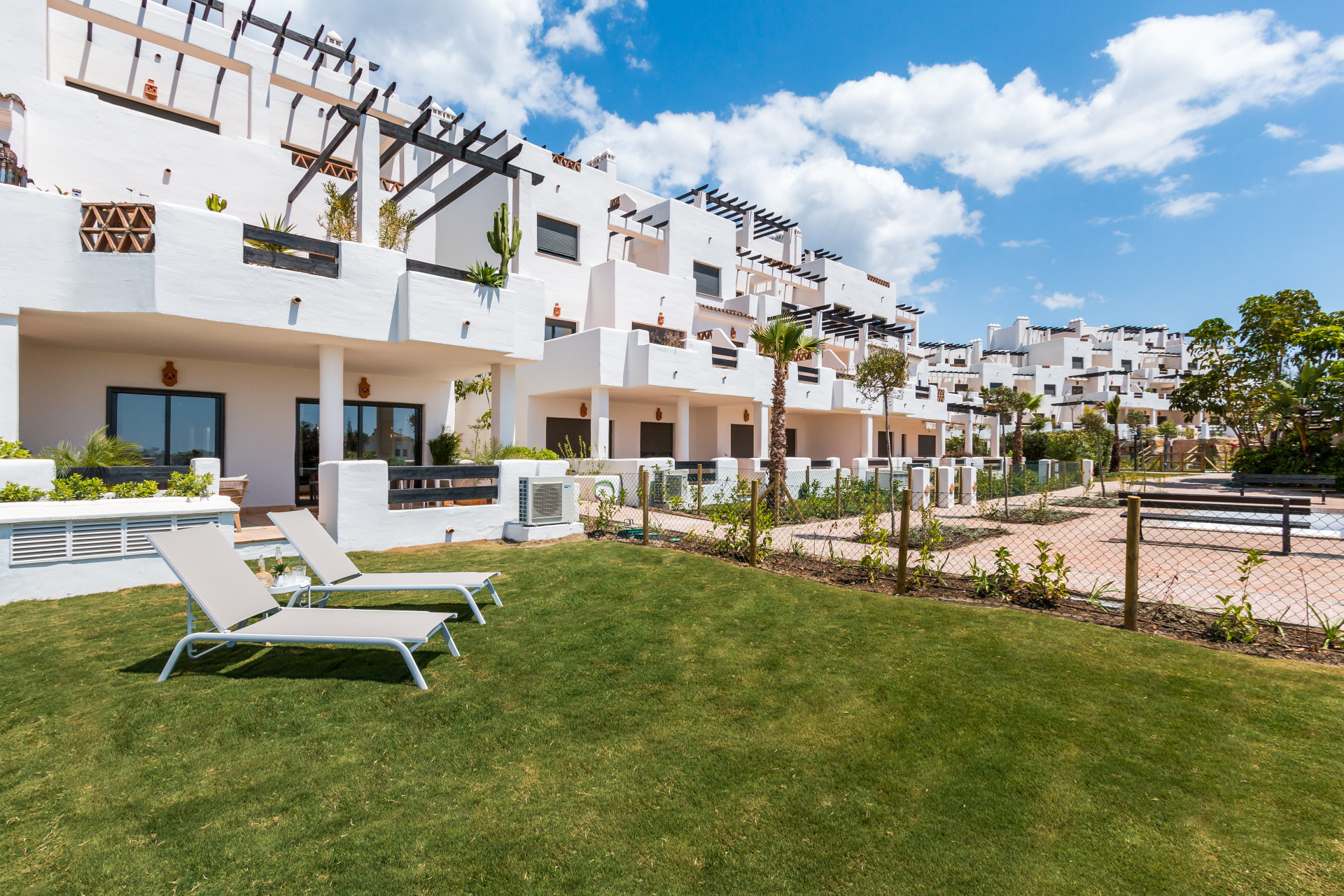 Bargain first line golf Andalusian style golf apartments for sale in Estepona - Costa del Sol