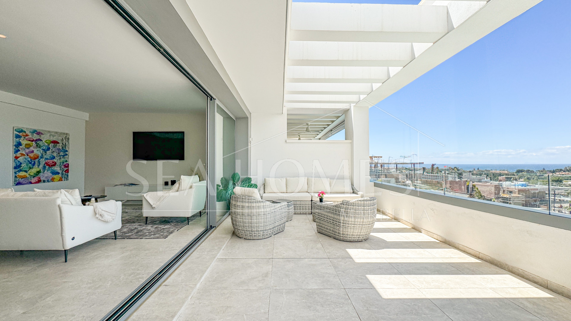 Contemporary penthouse with terrace and solarium both with panoramic views of the Mediterranean Sea in top location