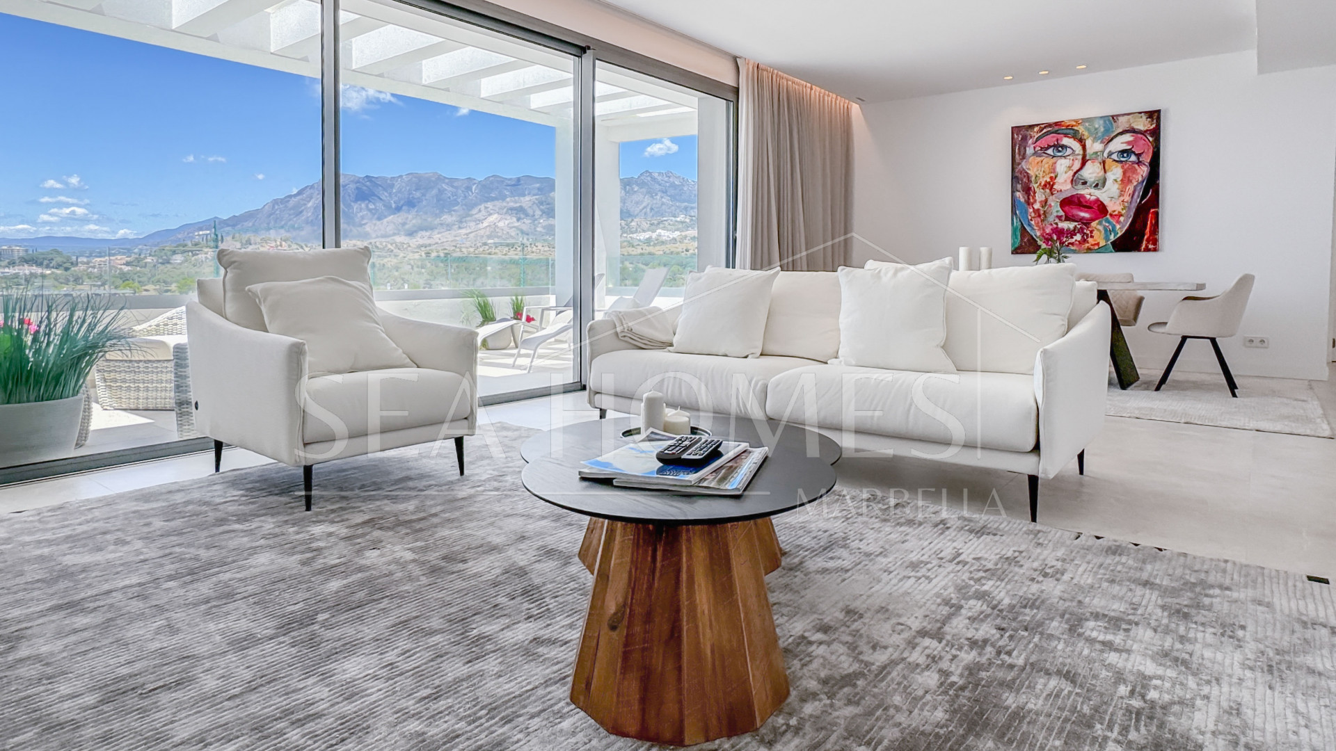 Contemporary penthouse with terrace and solarium both with panoramic views of the Mediterranean Sea in top location