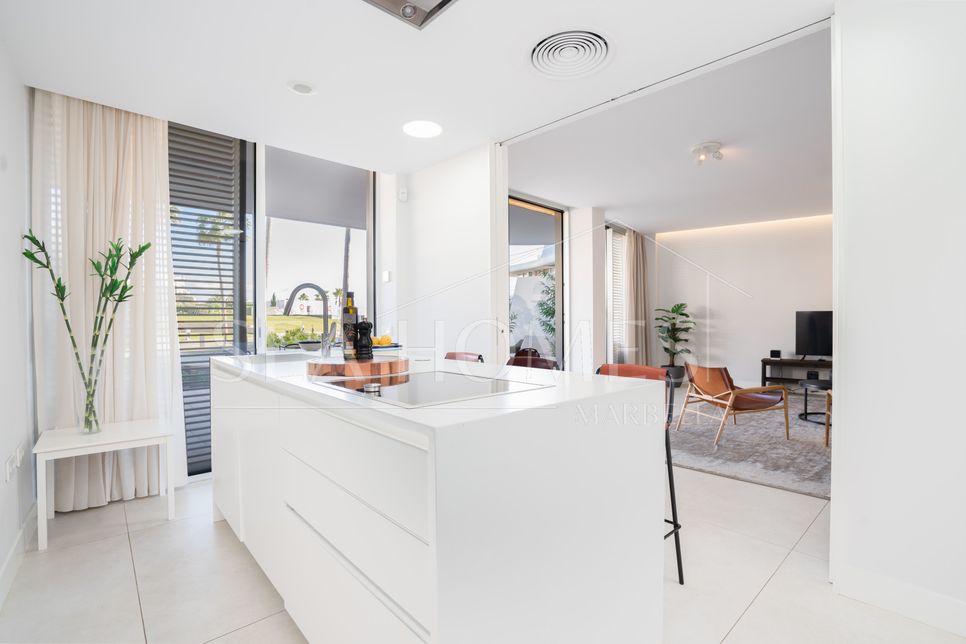 Luxurious beachfront apartment with private garden