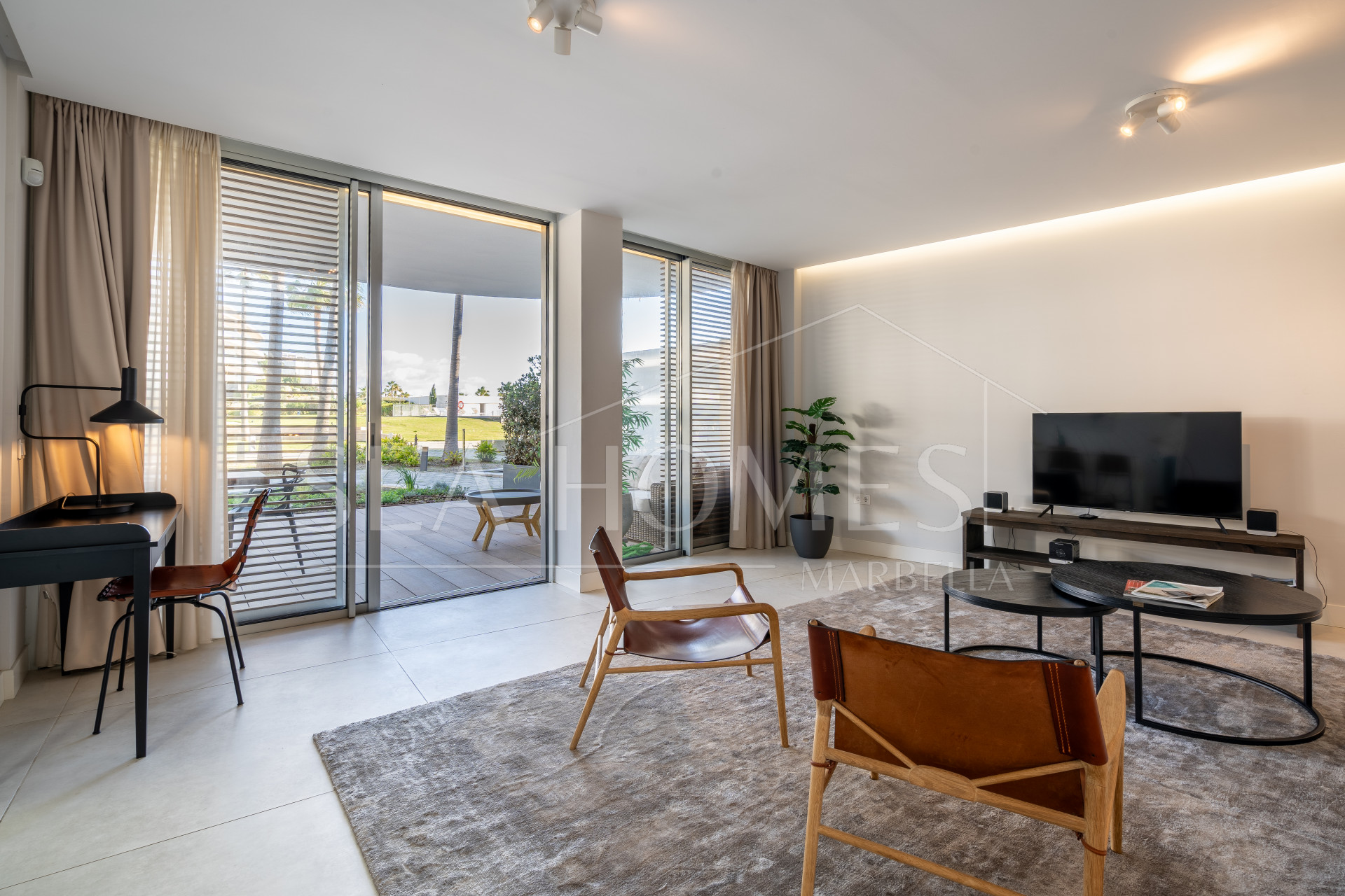Luxurious beachfront apartment with private garden