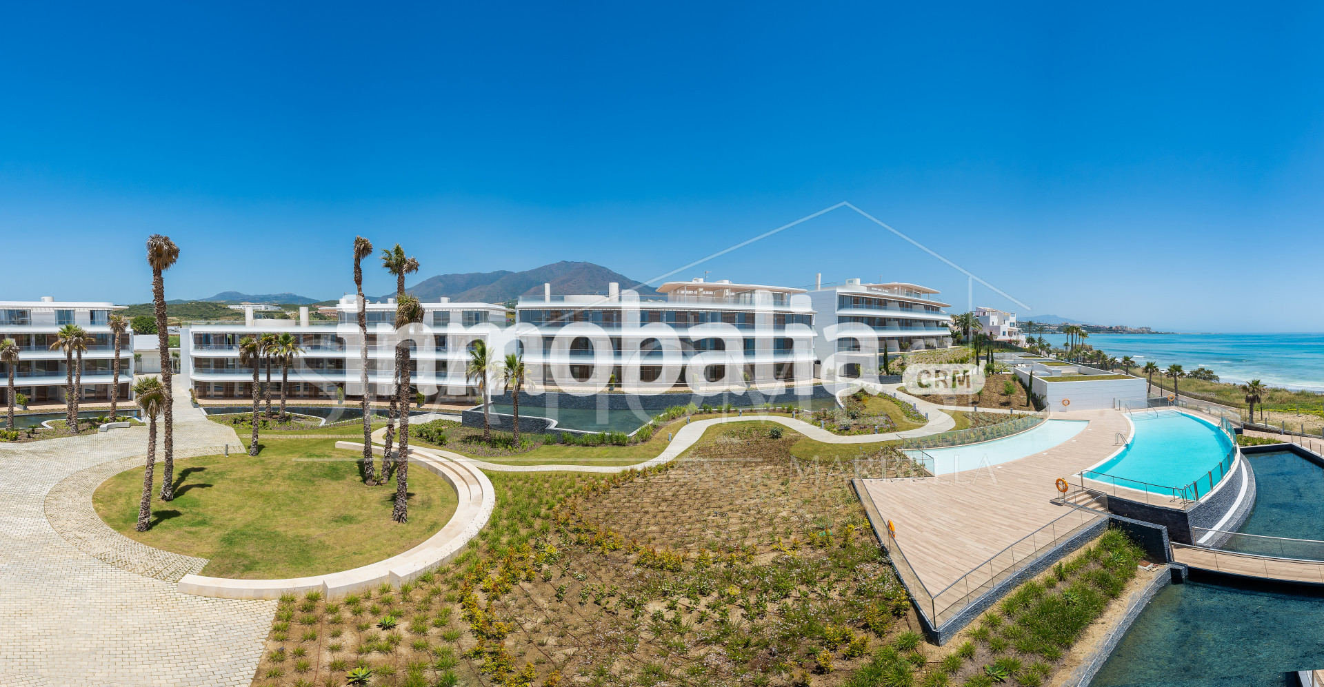 Luxurious beachfront apartment with private garden