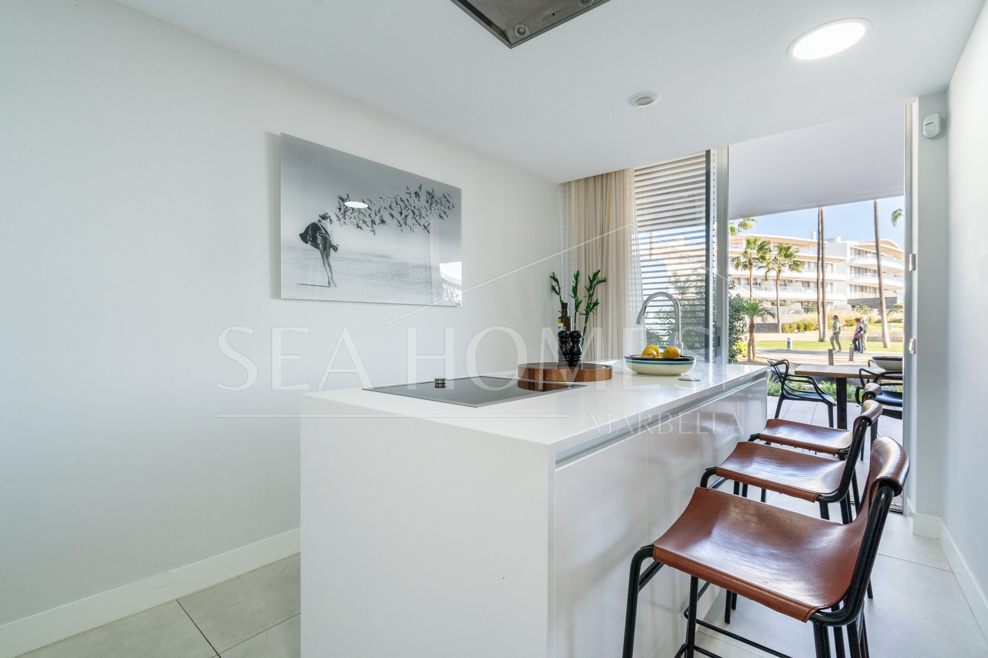 Luxurious beachfront apartment with private garden