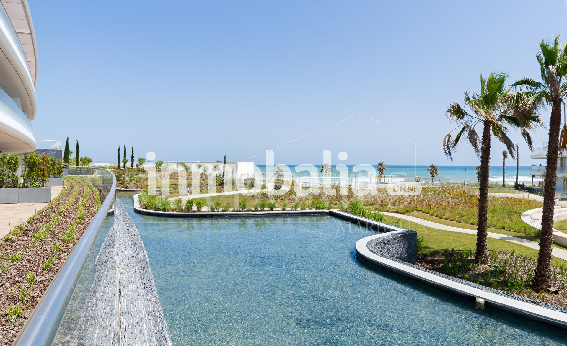 Luxurious beachfront apartment with private garden