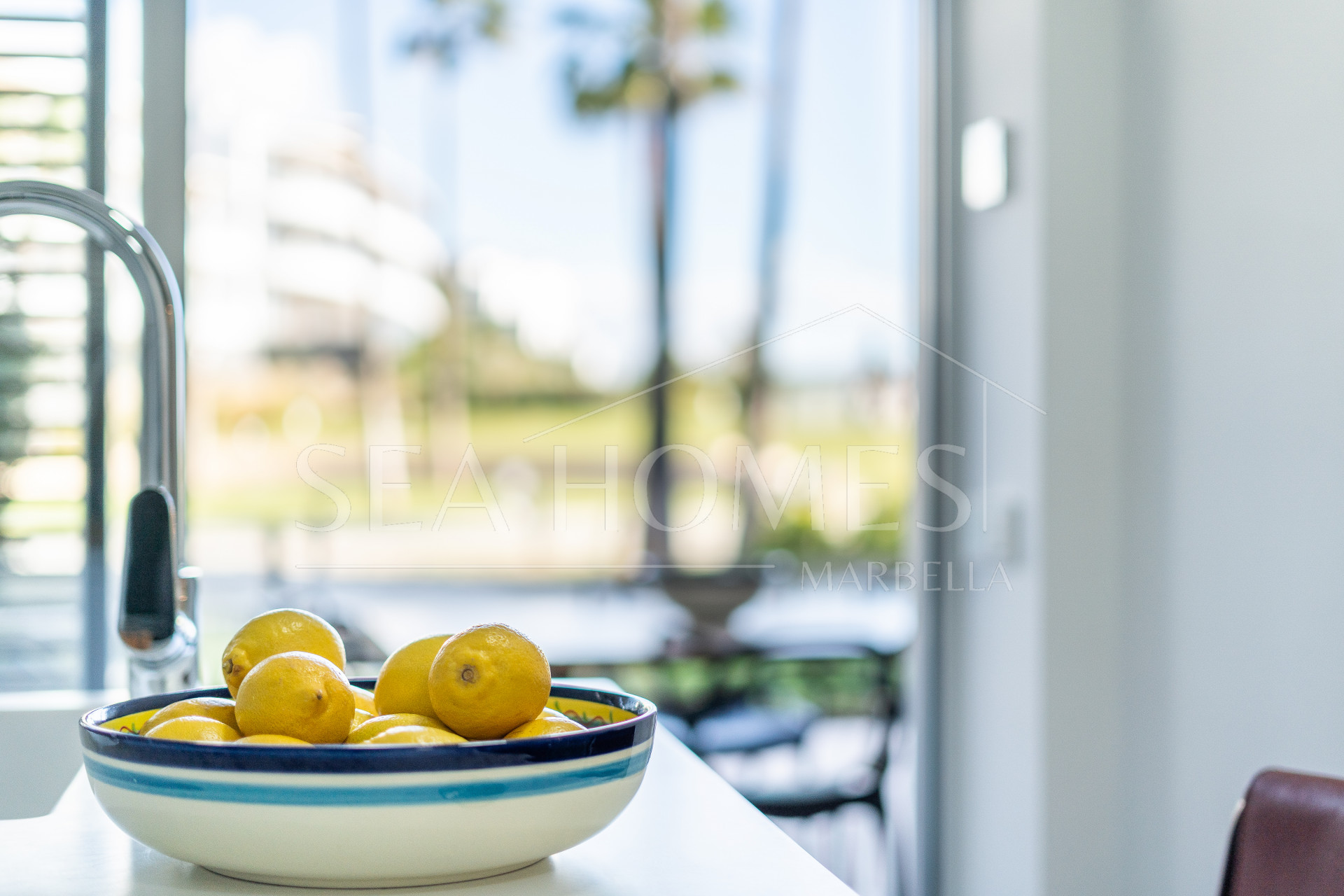 Luxurious beachfront apartment with private garden