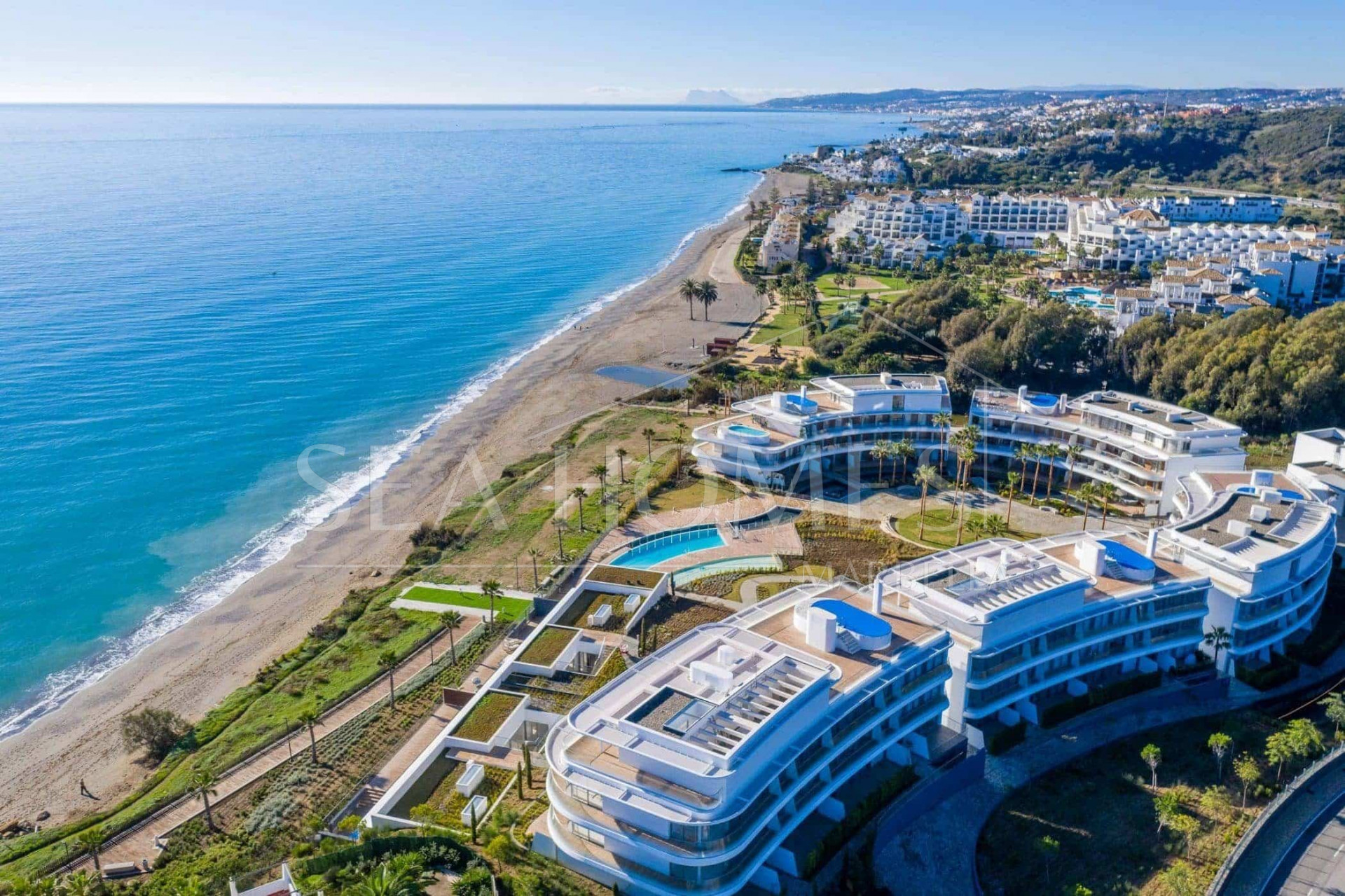 Luxurious beachfront apartment with private garden
