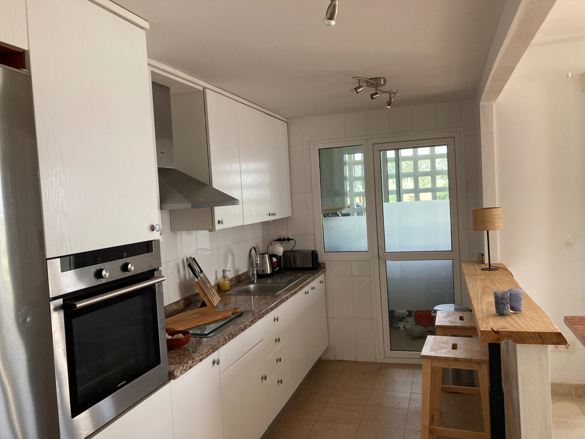 Frontline golf ground-floor apartment with stunning views in La Alcaidesa, near Sotogrande, Cadiz