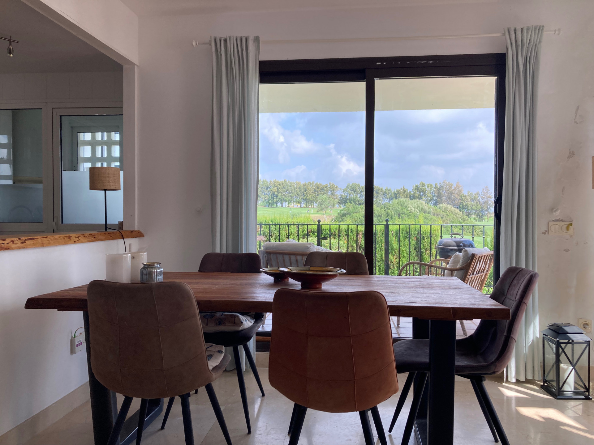 Frontline golf ground-floor apartment with stunning views in La Alcaidesa, near Sotogrande, Cadiz