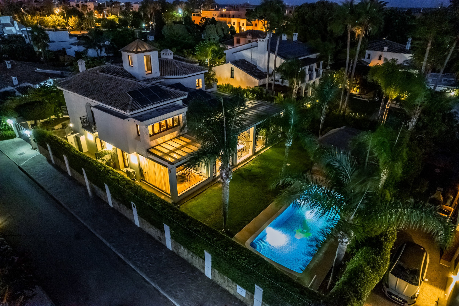Welcome to this exclusive three-level villa in San Pedro Playa