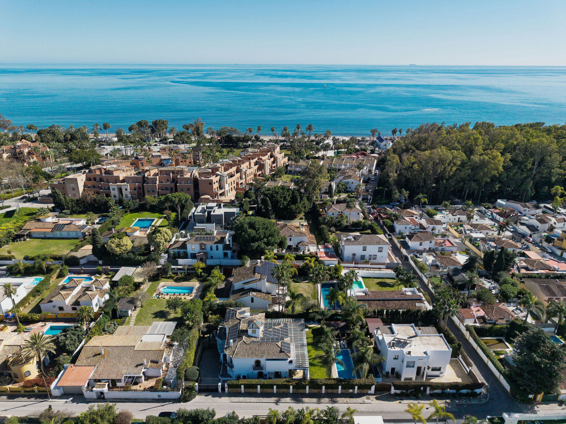 Welcome to this exclusive three-level villa in San Pedro Playa