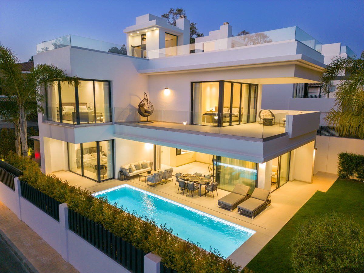 Modern villa by the sea, offering luxurious living in prime location.