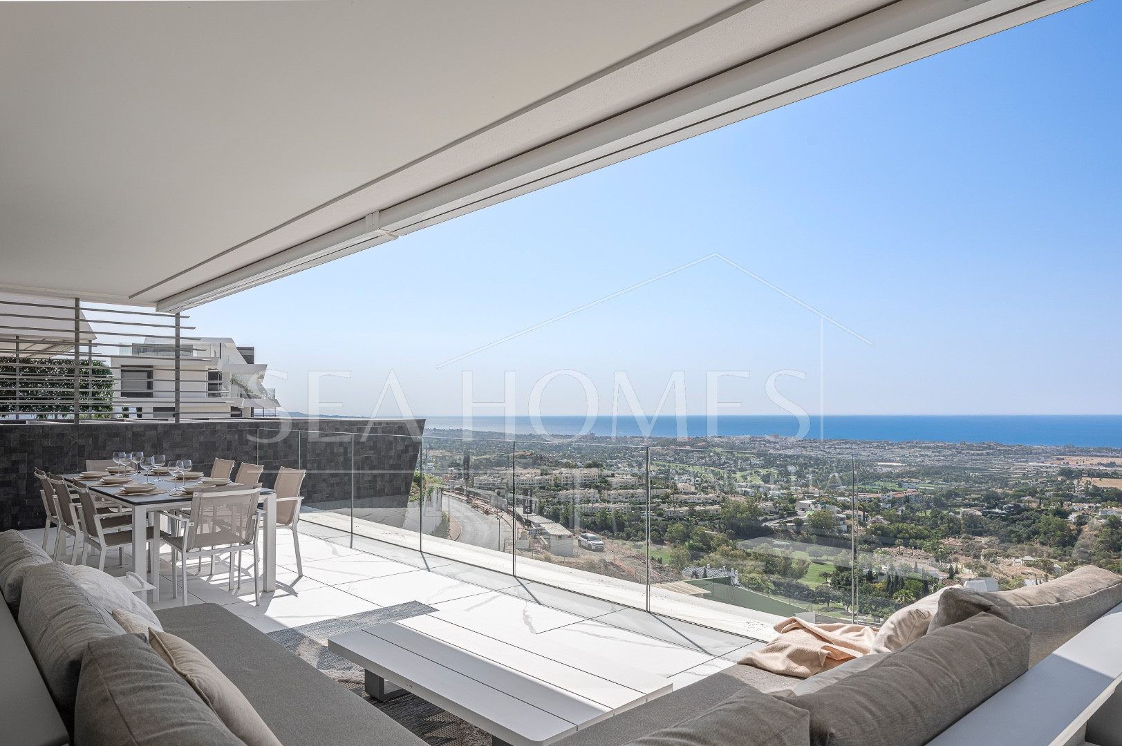 Stunning corner middle floor apartment with panoramic golf & sea views