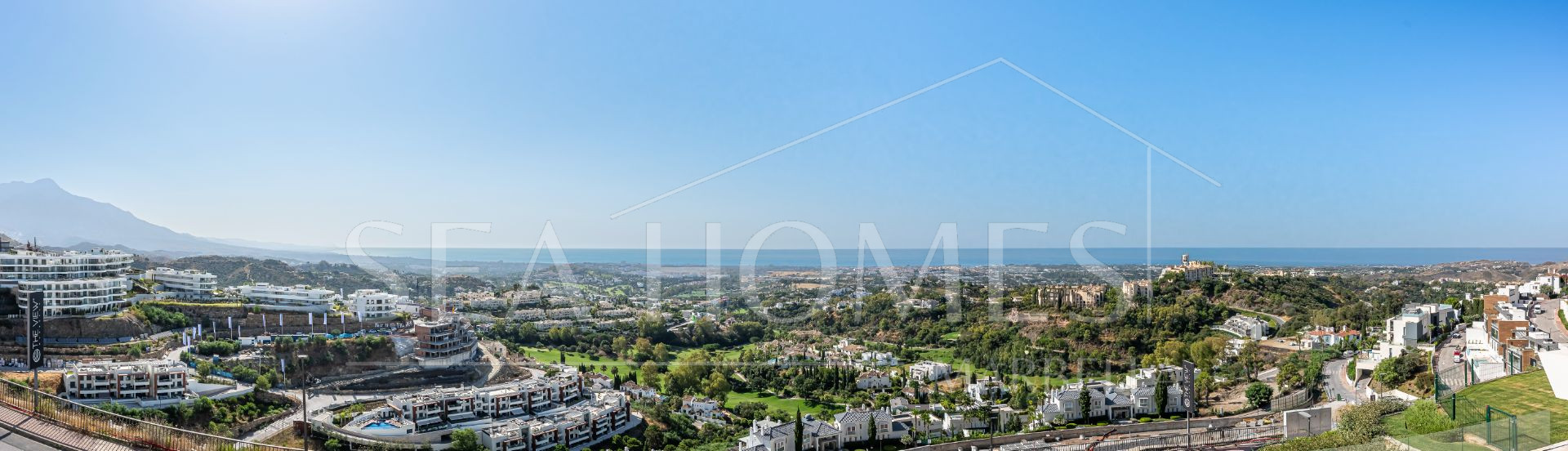 Stunning corner middle floor apartment with panoramic golf & sea views