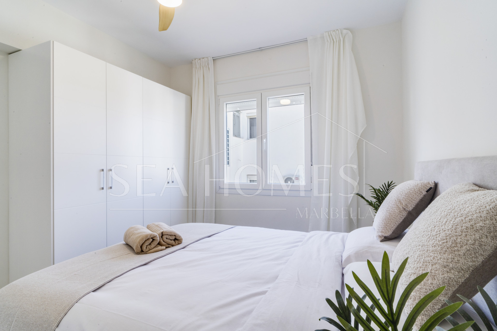 Superb Fully Renovated Three-Bedroom Apartment Steps from Estepona Beach