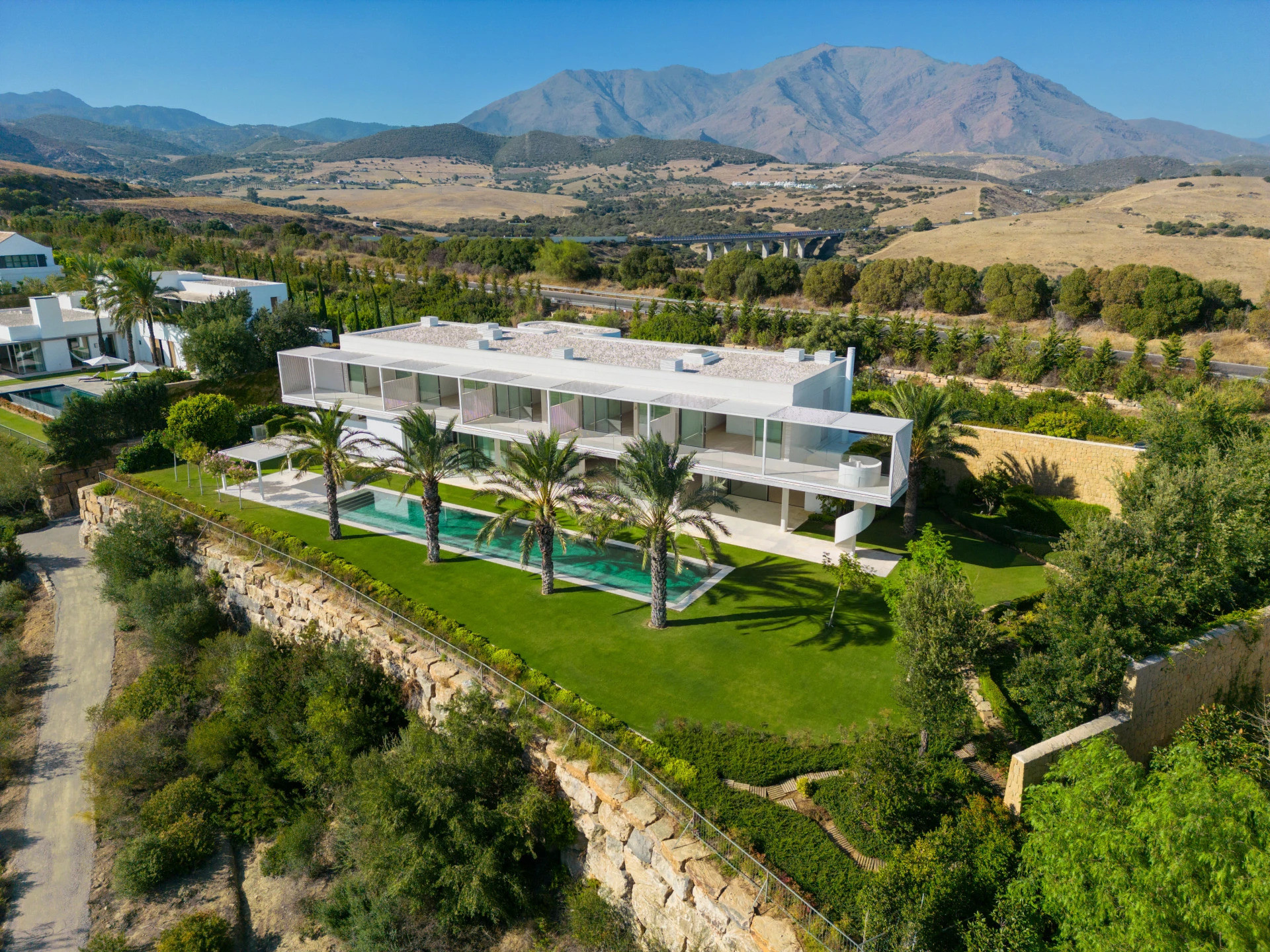 A Masterpiece of Luxury Living: Exquisite Villa with Panoramic Golf and Mediterranean Views