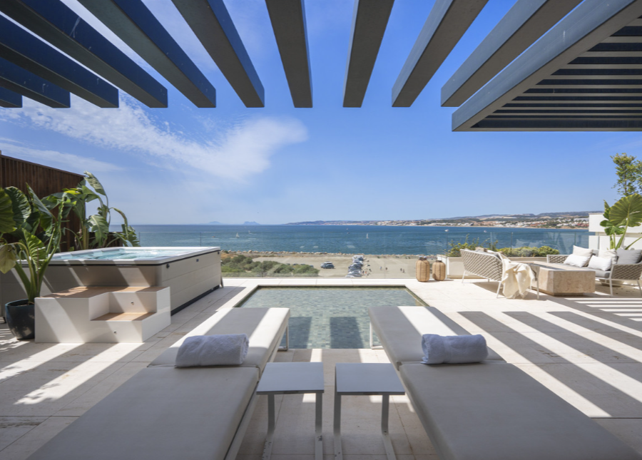 Luxury Beachfront Apartment for Sale in Estepona with Panoramic Sea Views