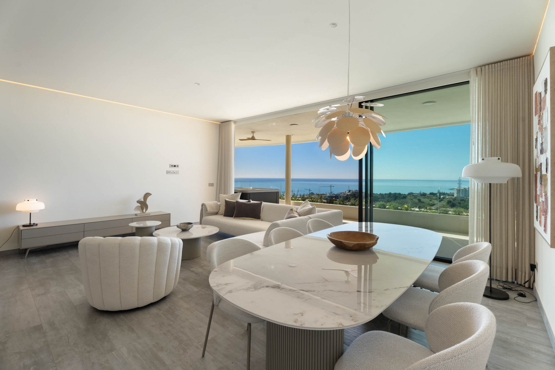 Contemporary Three-Bedroom Corner Apartment with Panoramic Sea Views in El Higueron