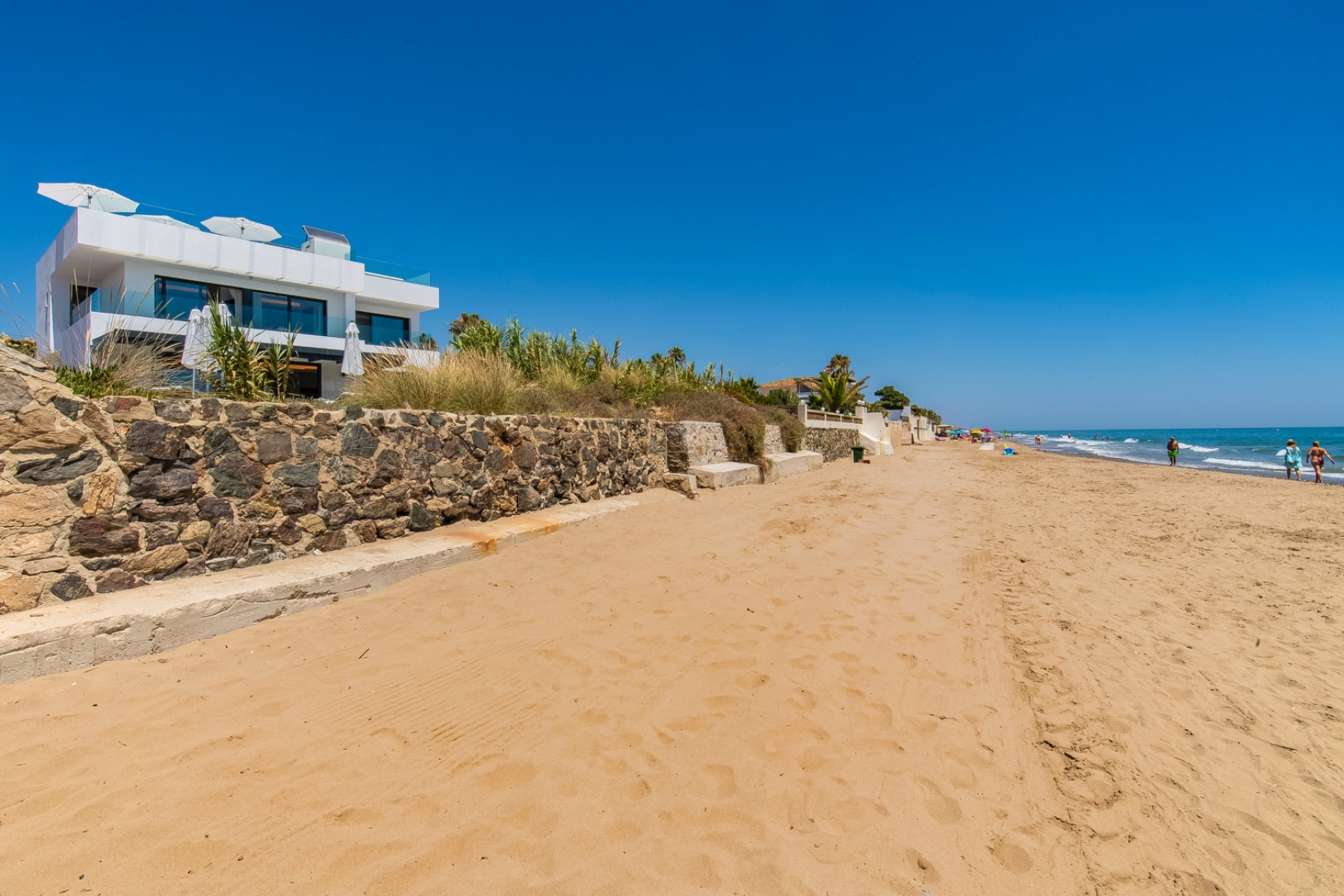 Divine, sleek & modern beachfront villa with mesmerizing views is the perfect idyllic property