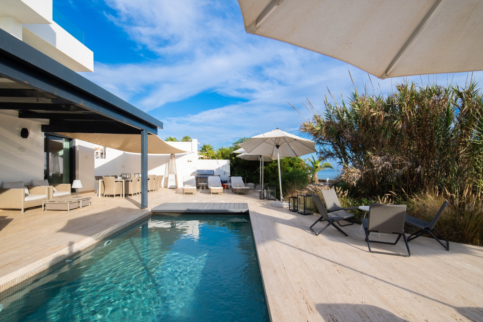 Divine, sleek & modern beachfront villa with mesmerizing views is the perfect idyllic property