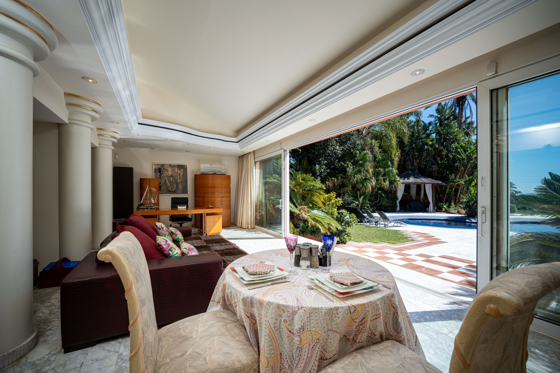 Secluded stately mansion languishes amidst subtropical gardens in the heart of Marbella.