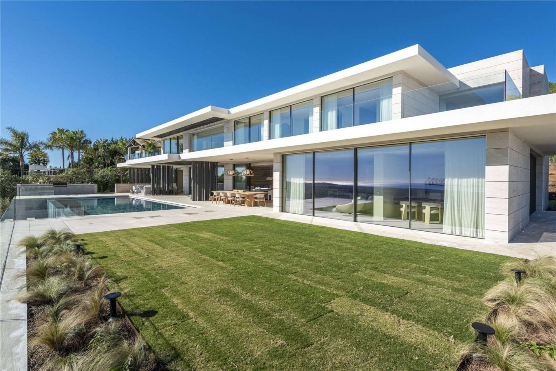 Ultra chic and modern residence flaunts 180º unparalleled views along southern Spanish coastline