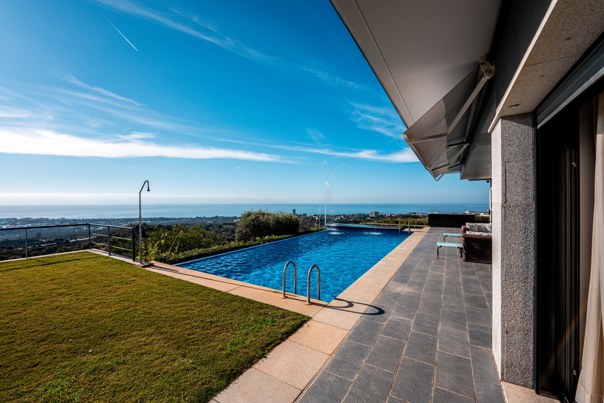 Stunning modern 5 bedroom villa perched on a hillside offering panoramic Mediterranean coastline views.