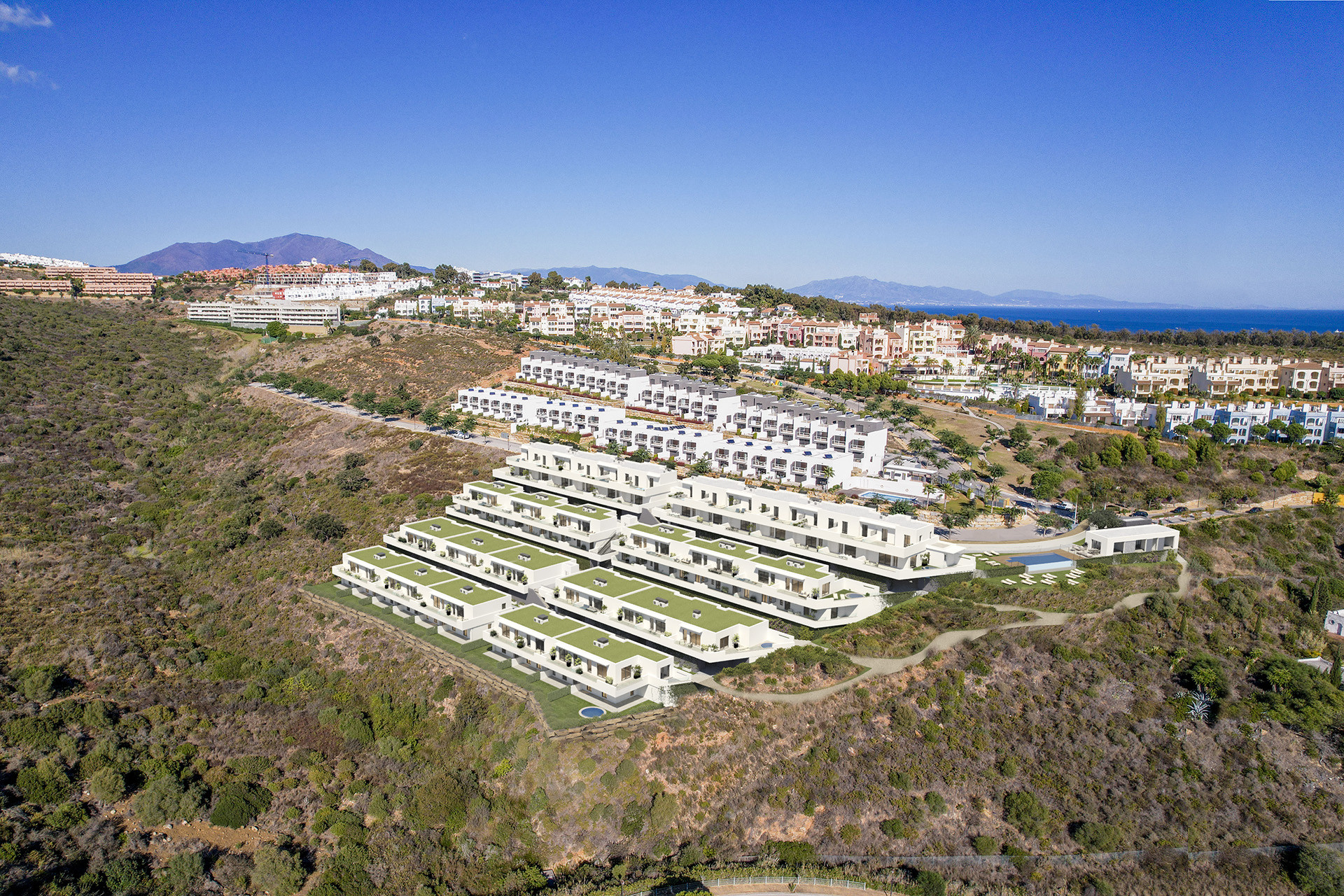 Exclusive Townhouses with Panoramic Sea Views in Manilva