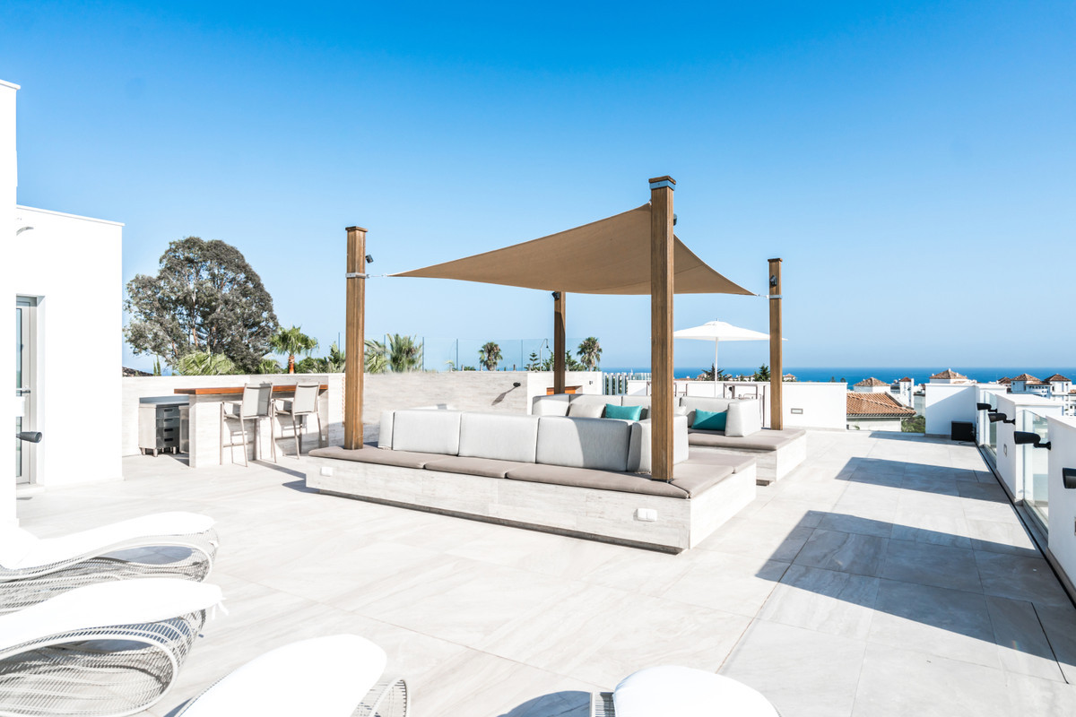Contemporary mansion featuring dining and entertaining areas connected with covered and sunny terraces, beautiful landscaped gardens, outdoor lounges, solarium, chill-out and al fresco dining areas
