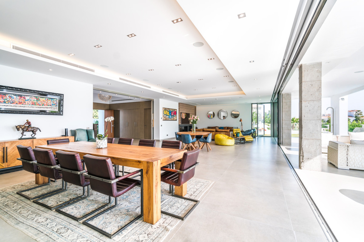 Contemporary mansion featuring dining and entertaining areas connected with covered and sunny terraces, beautiful landscaped gardens, outdoor lounges, solarium, chill-out and al fresco dining areas