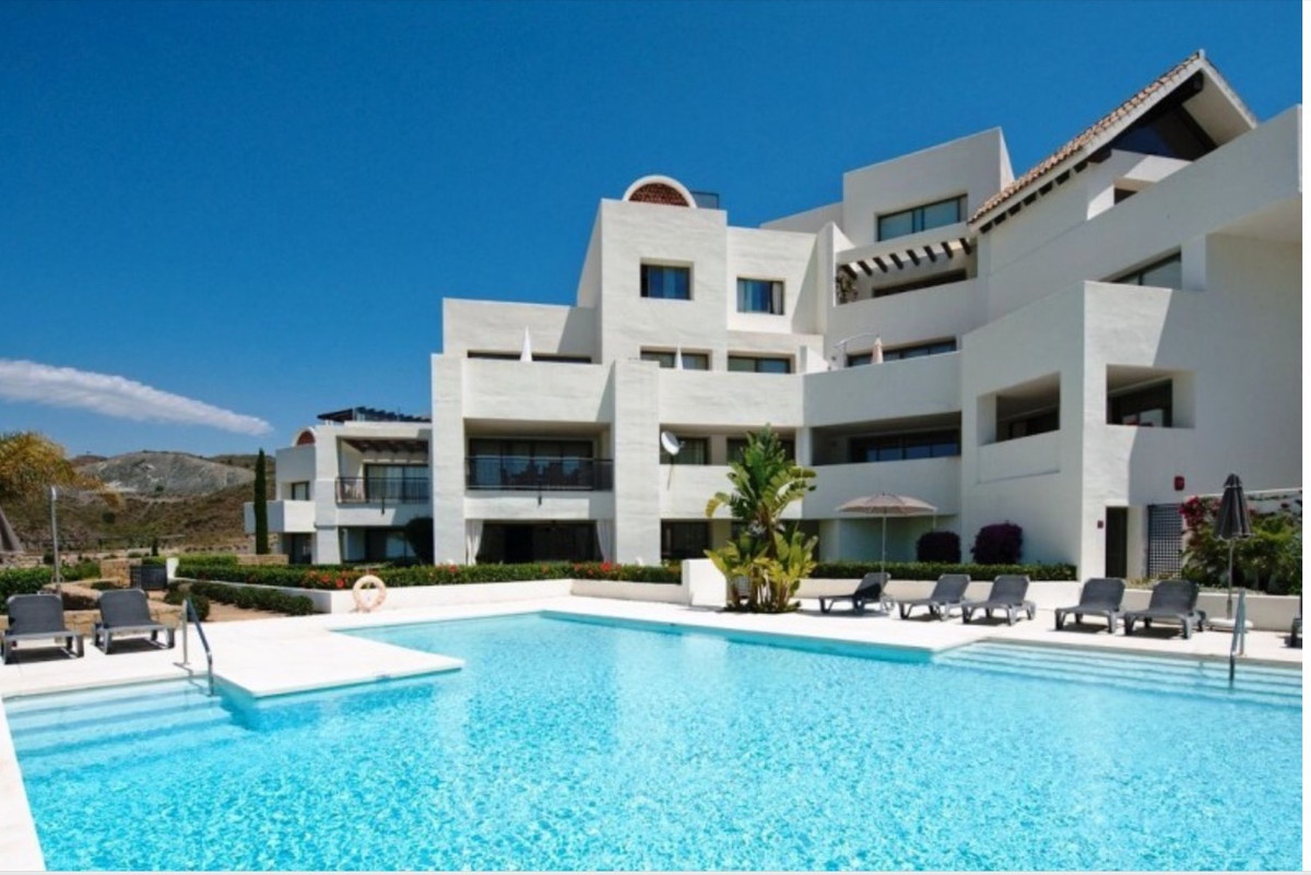 Ground floor contemporary apartment set in a gated complex in Los Flamingos