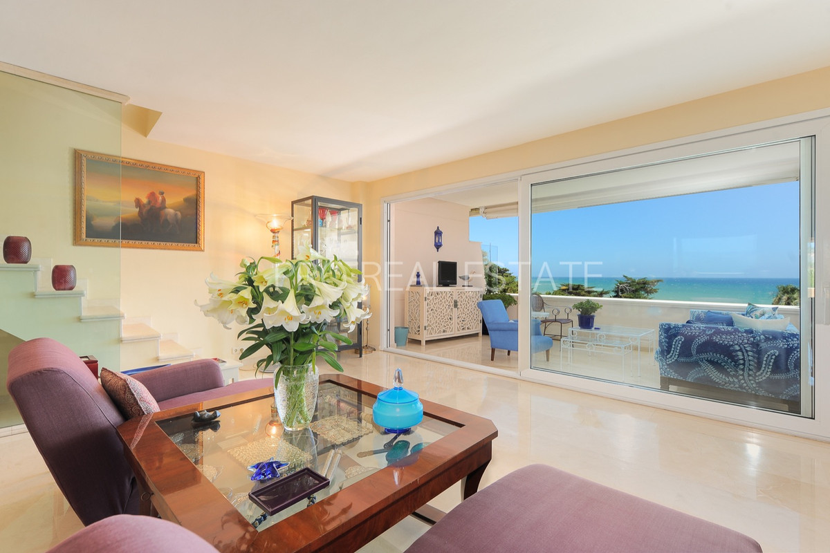 Sunny, highly unique, frontline beach penthouse is designed for a Mediterranean lifestyle in a gated community with incredible sea views
