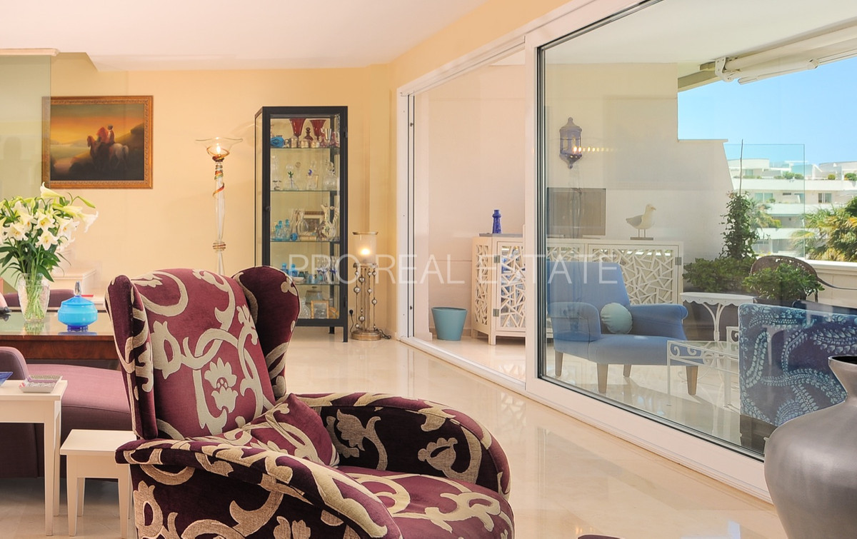 Sunny, highly unique, frontline beach penthouse is designed for a Mediterranean lifestyle in a gated community with incredible sea views