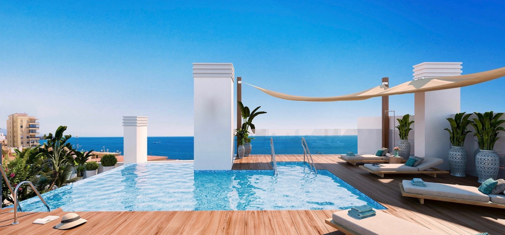 Maravillosa promoción residencial  situada en el centro de Estepona con espectaculares vistas al mar desde la piscina en la azotea